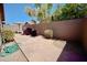 Private patio with stone pavers and block wall surround at 4527 E Amberwood Dr, Phoenix, AZ 85048