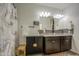 Stylish bathroom featuring a decorative shower curtain, vanity, and mosaic backsplash at 5267 E Diatomite Dr, San Tan Valley, AZ 85143