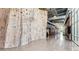 Indoor climbing gym with a tall rock climbing wall and fitness area at 5267 E Diatomite Dr, San Tan Valley, AZ 85143