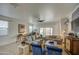 Spacious living room with tile flooring, neutral decor, and bright natural light at 5267 E Diatomite Dr, San Tan Valley, AZ 85143