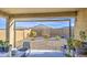 Covered patio overlooking a low maintenance backyard at 5267 E Diatomite Dr, San Tan Valley, AZ 85143