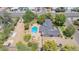 Expansive property featuring a private pool, desert landscaping, and a charming single-story home at 6330 E Delcoa Ave, Scottsdale, AZ 85254