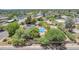 This home features mature landscaping, swimming pool, and desert surroundings at 6330 E Delcoa Ave, Scottsdale, AZ 85254