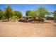 Spacious backyard featuring a wall and a pile of wood for the fireplace at 6330 E Delcoa Ave, Scottsdale, AZ 85254