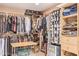 Walk in closet features shelving, clothing racks, and organization at 6330 E Delcoa Ave, Scottsdale, AZ 85254