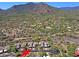 Expansive desert community home with desert landscaping and serene mountain views at 6714 E Nightingale Cir, Scottsdale, AZ 85266