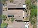 Aerial view of a desert home with patio and backyard at 6714 E Nightingale Cir, Scottsdale, AZ 85266