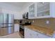 Well-appointed kitchen with stainless steel appliances, granite countertops, and ample cabinet space at 6714 E Nightingale Cir, Scottsdale, AZ 85266