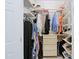 Walk-in closet features custom shelving at 6714 E Nightingale Cir, Scottsdale, AZ 85266