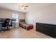 Comfortable bedroom with plenty of natural light, tile flooring and a closet at 7238 N 126Th Ln, Glendale, AZ 85307