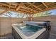 Imagine relaxing in this covered backyard hot tub on a cool night, complete with lights and privacy at 7238 N 126Th Ln, Glendale, AZ 85307