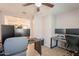 Bright office features modern wood-look tile flooring and neutral paint at 7238 N 126Th Ln, Glendale, AZ 85307