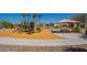 Modern playground area with a variety of play structures and shaded picnic spot at 7238 N 126Th Ln, Glendale, AZ 85307