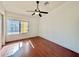 Sunlit bedroom with hardwood floors and a ceiling fan at 7801 N 44Th Dr # 1180, Glendale, AZ 85301