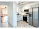 Modern kitchen with stainless appliances, bright cabinetry, and open floor plan at 7801 N 44Th Dr # 1180, Glendale, AZ 85301