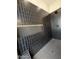 Modern shower featuring dark subway tile and a unique storage niche at 81 E Smoke Tree Rd, Gilbert, AZ 85296