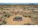Aerial view of a home showcasing desert landscape and views at 873 N Windy Meadow Ln, Maricopa, AZ 85139