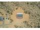 Aerial view home showing surrounding area, desert landscaping and gravel at 873 N Windy Meadow Ln, Maricopa, AZ 85139