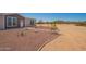 Charming single-Gathering home with rock landscaping and a walkway leading to the front door at 873 N Windy Meadow Ln, Maricopa, AZ 85139