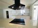 Modern kitchen featuring white cabinets, stone countertops, and stainless steel appliances at 9053 N 53Rd Ave, Glendale, AZ 85302