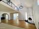 An open-concept living space featuring wood flooring and an abundance of natural light at 9053 N 53Rd Ave, Glendale, AZ 85302