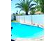 Beautiful backyard with a refreshing pool and secure white fence, perfect for enjoying summer days at 9053 N 53Rd Ave, Glendale, AZ 85302