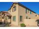 Attractive two-story home with well-kept desert landscaping at 909 E Agua Fria Ln, Avondale, AZ 85323