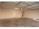 Spacious two car garage featuring utility connections and ample room for storage at 909 E Agua Fria Ln, Avondale, AZ 85323