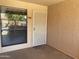 Inviting front entrance showcasing a secure door and pleasant view through a window at 1340 N Recker Rd # 154, Mesa, AZ 85205
