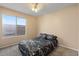 Bedroom with a bed and a window that provides lots of natural light at 1415 W Michigan Ave, Phoenix, AZ 85023