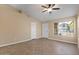 Inviting living area features tile flooring and large windows at 1415 W Michigan Ave, Phoenix, AZ 85023
