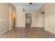 Expansive living room with tile floors, a view of the entryway, and ample space at 1415 W Michigan Ave, Phoenix, AZ 85023