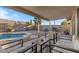 Backyard featuring a covered patio and a pool, perfect for outdoor living at 1415 W Michigan Ave, Phoenix, AZ 85023