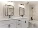 Bathroom featuring double sinks, updated fixtures, and modern design for optimal comfort and style at 1521 W Jacinto Ave, Mesa, AZ 85202