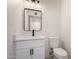 Updated bathroom featuring a sleek vanity, modern fixtures, and contemporary design at 1521 W Jacinto Ave, Mesa, AZ 85202