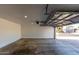Spacious garage with automatic door opener and room for parking and storage at 1521 W Jacinto Ave, Mesa, AZ 85202