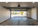 Open garage showcasing a clean interior and access to the outside at 1521 W Jacinto Ave, Mesa, AZ 85202