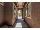 Charming front porch with tiled entryway and desert landscaping at 162 W Raven Dr, Chandler, AZ 85286