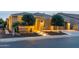 Inviting front entrance with manicured landscaping, accent lighting and a well-maintained walkway leading to the front door at 1673 E Laddoos Ave, Queen Creek, AZ 85140