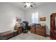 Office featuring a desk, chair, drawers, bookshelf, hutch, and window with shutter at 1673 E Laddoos Ave, Queen Creek, AZ 85140