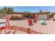 Large backyard featuring a charming gazebo, cozy fire pit area, and gravel landscaping for easy maintenance at 18217 N 34Th Ave, Phoenix, AZ 85053