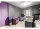 A quiet room with purple chairs, natural light, and a calm space ready for your personal design touches at 18217 N 34Th Ave, Phoenix, AZ 85053