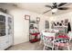 Bright dining area features white brick walls, a decorative baker's rack, and cozy seating for intimate gatherings at 18217 N 34Th Ave, Phoenix, AZ 85053