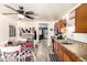 Bright kitchen area with a view into the living room offering lots of light and space for entertaining at 18217 N 34Th Ave, Phoenix, AZ 85053
