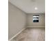 Neutral room with tile floor and window at 18389 W Long Lake Rd, Goodyear, AZ 85338