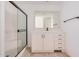 Bright bathroom with a shower, vanity, and large mirror at 201 S 91St St, Mesa, AZ 85208