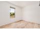 Bright bedroom features a large window that provides natural light at 201 S 91St St, Mesa, AZ 85208