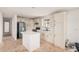 Open kitchen featuring stainless steel appliances, white cabinetry, and a functional center island at 201 S 91St St, Mesa, AZ 85208