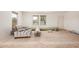 Open living space with natural light, prepped for flooring, and ready for customization at 201 S 91St St, Mesa, AZ 85208