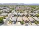 Wide aerial view of a suburban neighborhood with single-Gathering homes, showcasing the community's layout and location at 2717 W Bowker St, Phoenix, AZ 85041